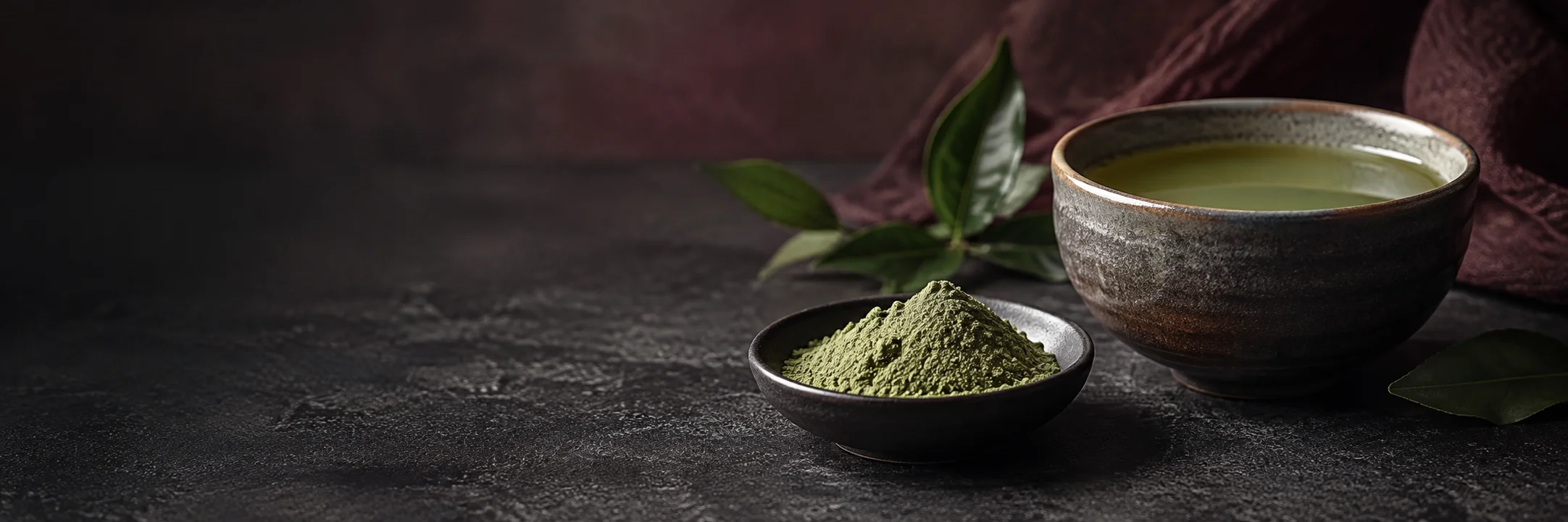 Fine muted-green matcha powder and a plain bowl of green tea illustrating supplements greens superfood product-format context.
